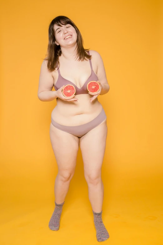 a woman in a bikini holding two grapefruits, shutterstock contest winner, y 2 k cutecore clowncore, portrait full body, bbwchan, high resolution photo