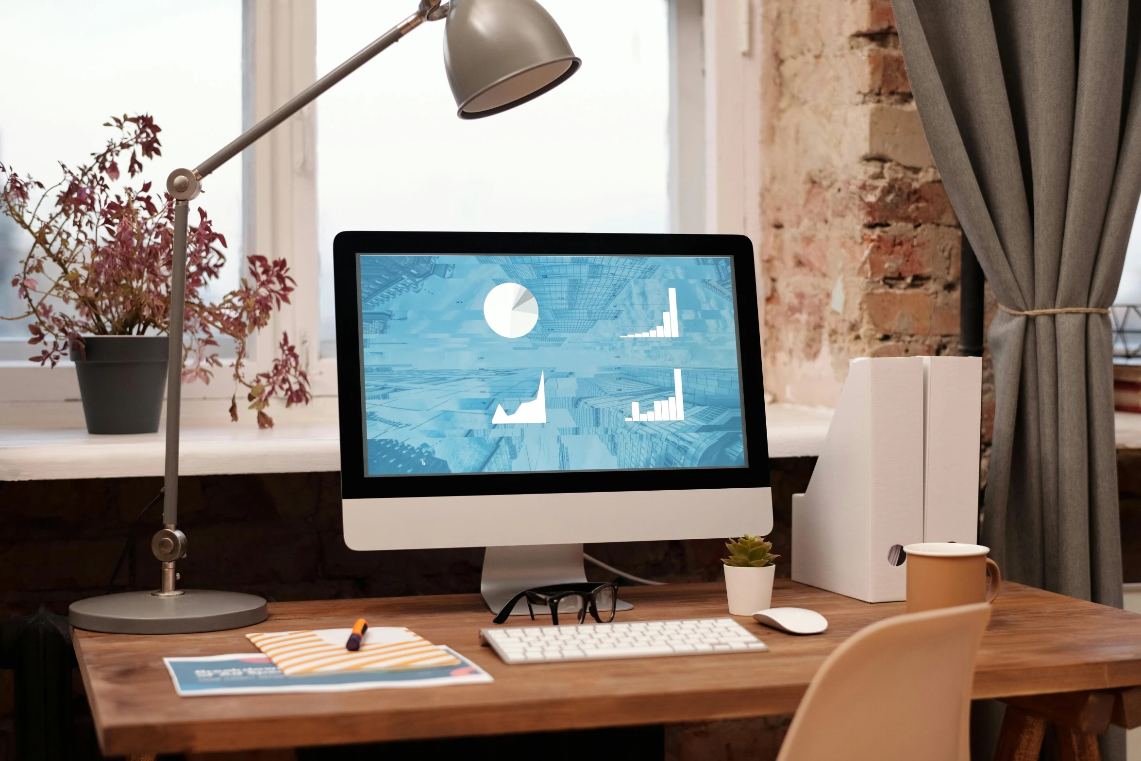 a computer monitor sitting on top of a wooden desk, inspired by Emiliano Ponzi, trending on pexels, style of monument valley, samorost, # screenshotsaturday, full device