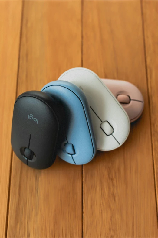 a couple of mouses sitting on top of a wooden floor, official product image, eora, mate colors, thumbnail