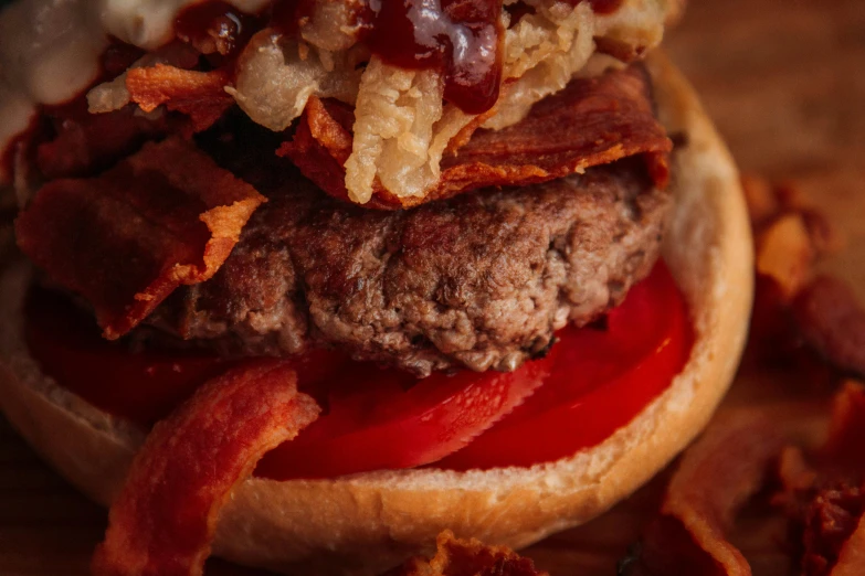 a close up of a hamburger with bacon and ketchup, a portrait, by Joe Bowler, unsplash, portrait of gigachad, a wooden, reds, historical photo