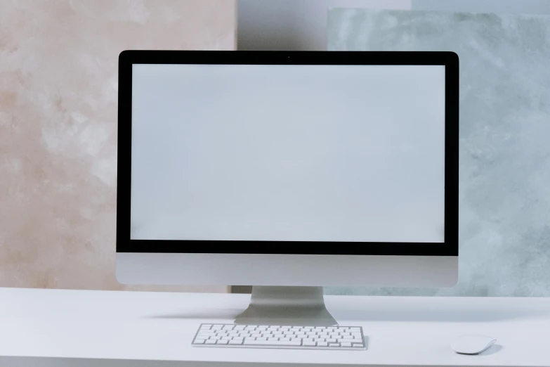 a computer monitor sitting on top of a white desk, pexels, on a pale background, background image, system unit, plasma display