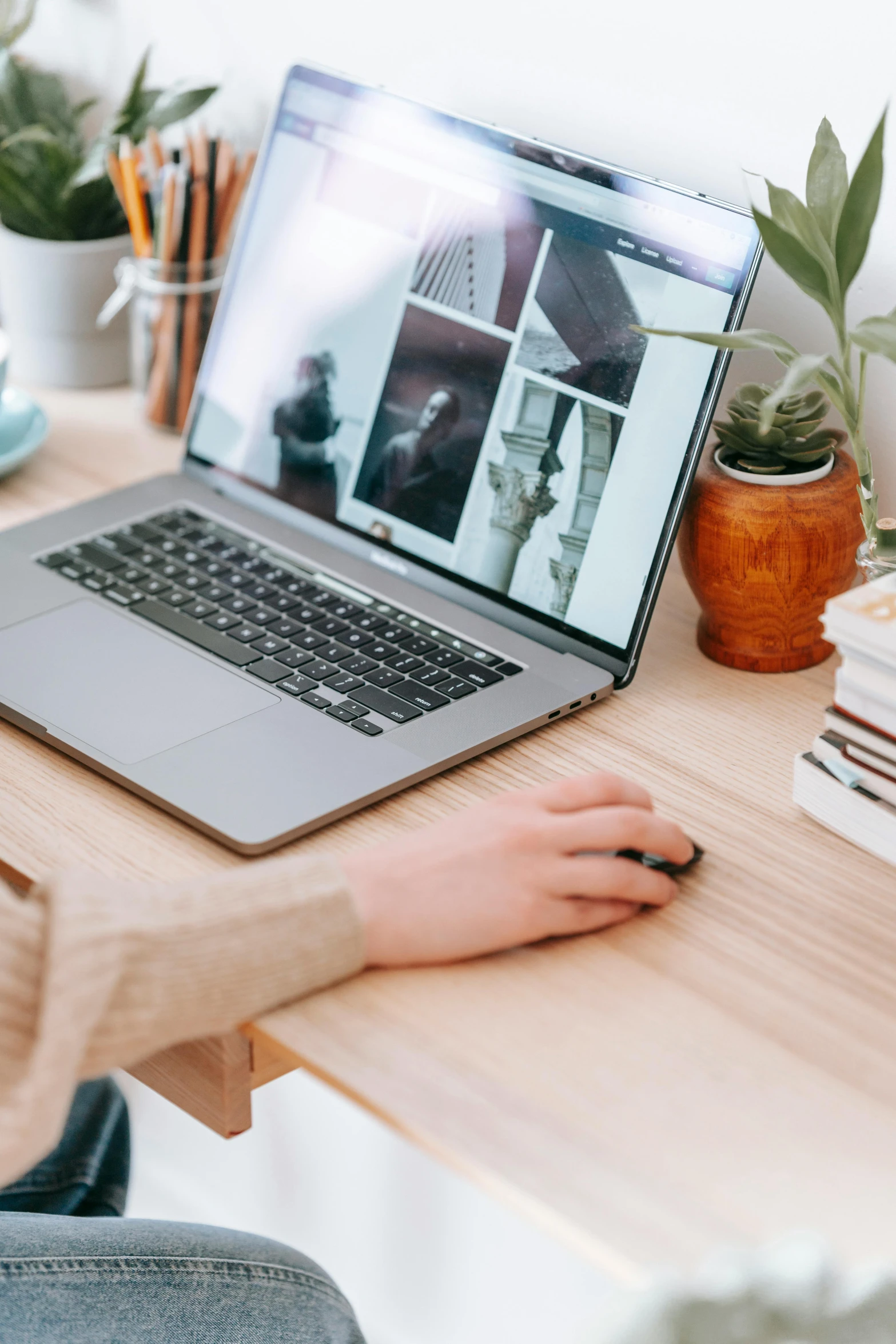 a person sitting at a desk with a laptop, trending on pexels, sustainable materials, avatar image, professional profile picture, award winning webdesign