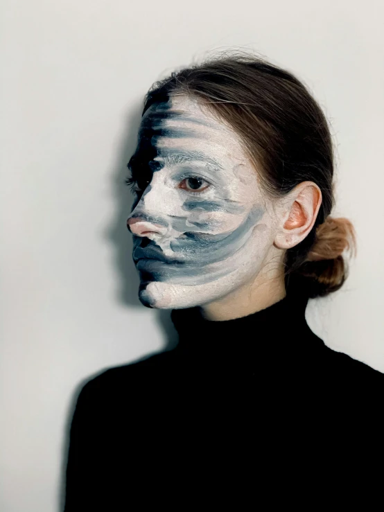 a woman with white paint on her face, inspired by Anna Füssli, distorted pose, instagram post, painted black, bluish face