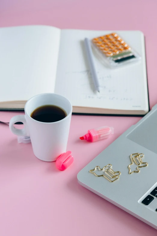 a laptop computer sitting on top of a desk next to a cup of coffee, by Julia Pishtar, pink accents, uncropped, multiple stories, organized