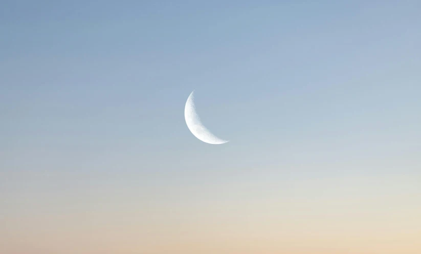 the moon is shining brightly in the blue sky, an album cover, unsplash, minimalism, crescent moon, early dawn, white, ignant