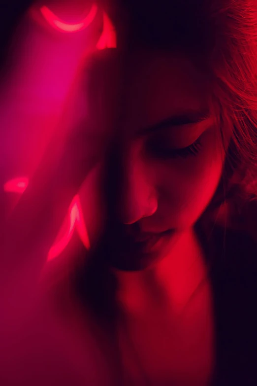 a woman standing in front of a red light, inspired by Elsa Bleda, digital art, young asian woman, ((pink)), cinematic closeup, jingna zhang