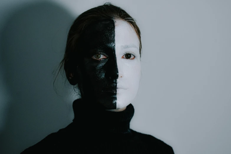 a woman with black and white paint on her face, inspired by Nicola Samori, pexels contest winner, antipodeans, half robot and half woman, symmetrical face and full body, korean symmetrical face, light and dark