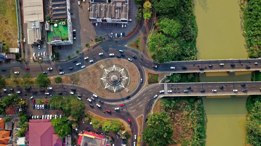 a bird's eye view of a busy intersection, by Bernardino Mei, pexels contest winner, renaissance, kerala motifs, monument, panoramic shot, thumbnail