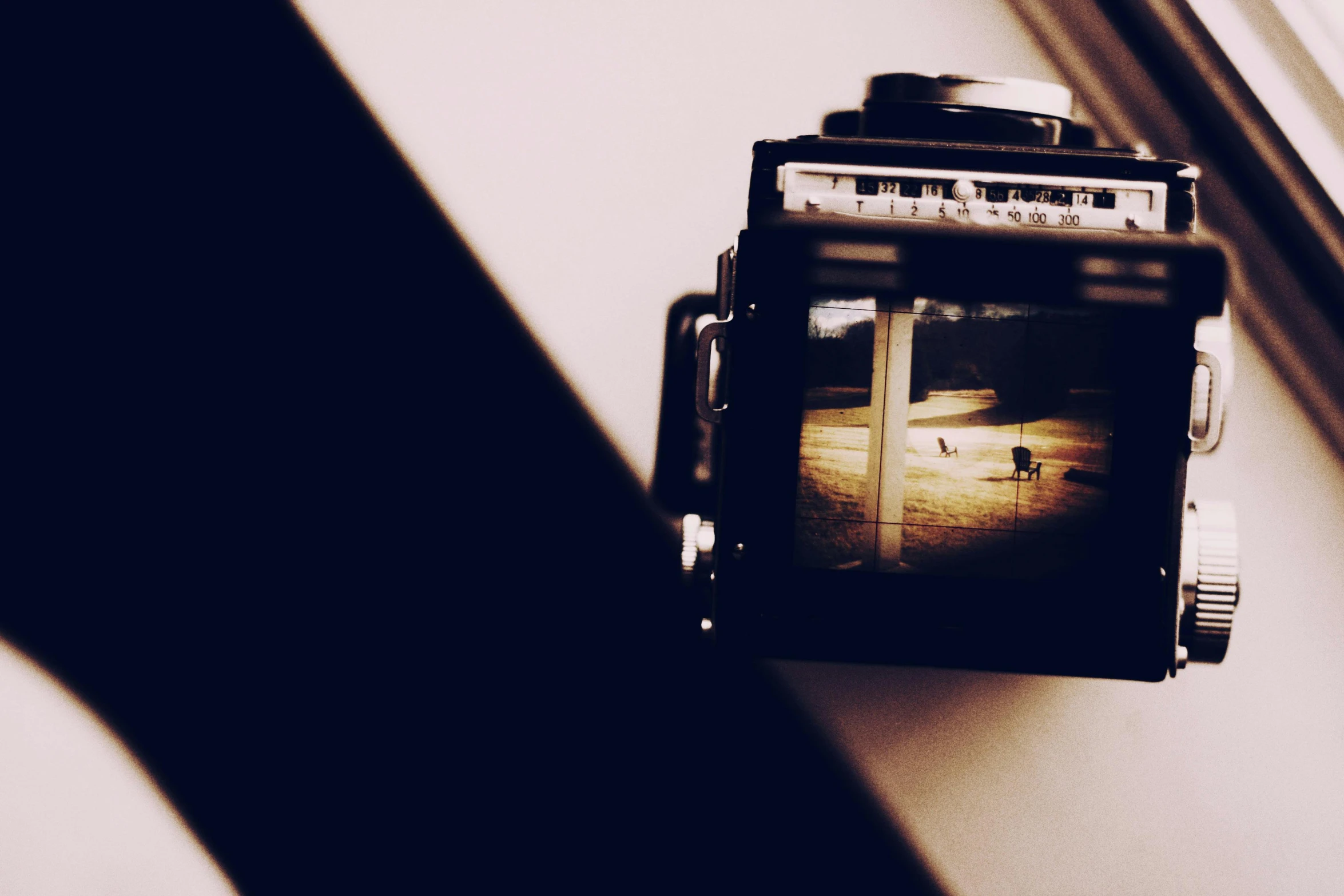 a camera sitting on top of a window sill, inspired by Louis Faurer, unsplash, art photography, medium format, ((sharp focus)), old timey, gopro photo