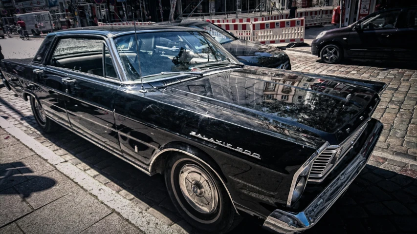 a black car parked on the side of the road, by Daniel Seghers, pexels contest winner, photorealism, glass and metal : : peugot onyx, streets of new york, retro effect, ford fusion