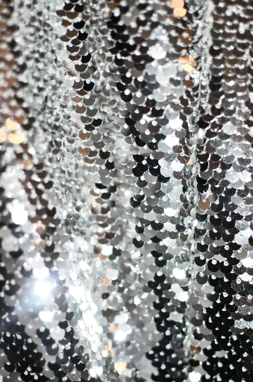 a bunch of silver sequins hanging from a ceiling, close up to the screen, 64x64, detailing, tall