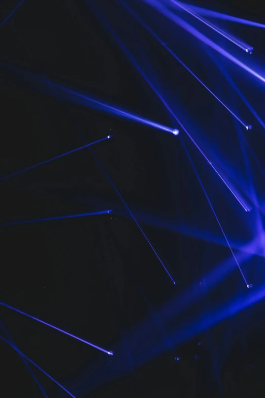 a bunch of lights that are in the dark, a microscopic photo, pexels contest winner, light and space, thick blue lines, scene from a rave, plain background, geometric light rays