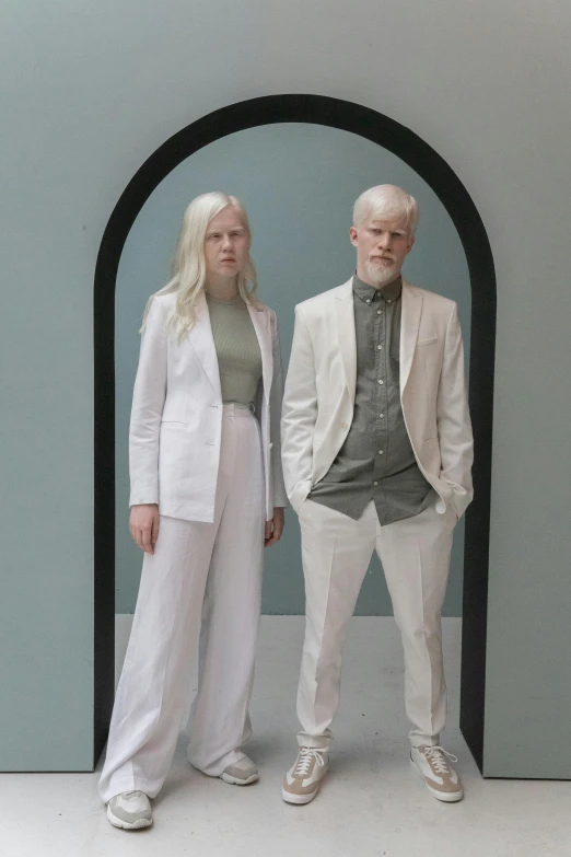 a couple of people standing next to each other, by Sara Saftleven, intense albino, wearing futuristic white suit, white stone arches, minna sundberg