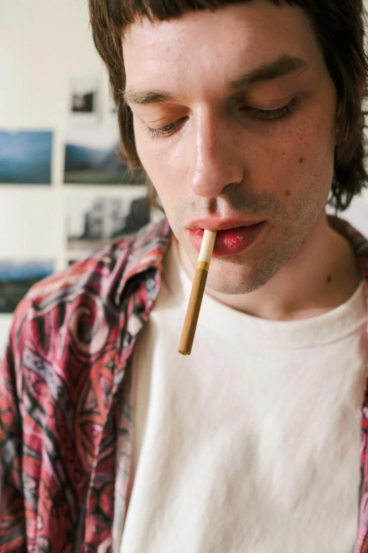 a man with a cigarette in his mouth, an album cover, by Adam Dario Keel, unsplash, hyperrealism, adam ondra, with a straw, stoner, a wooden