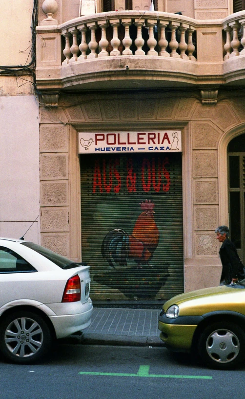 a couple of cars parked in front of a building, by Luis Molinari, illustration of an angry rooster, low quality photo, old signs, polychaeta