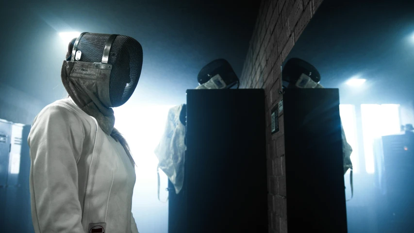 a close up of a person wearing a fencer's mask, a portrait, unsplash contest winner, stood in a cell, dramatic lighting render, tv still, looking into a mirror