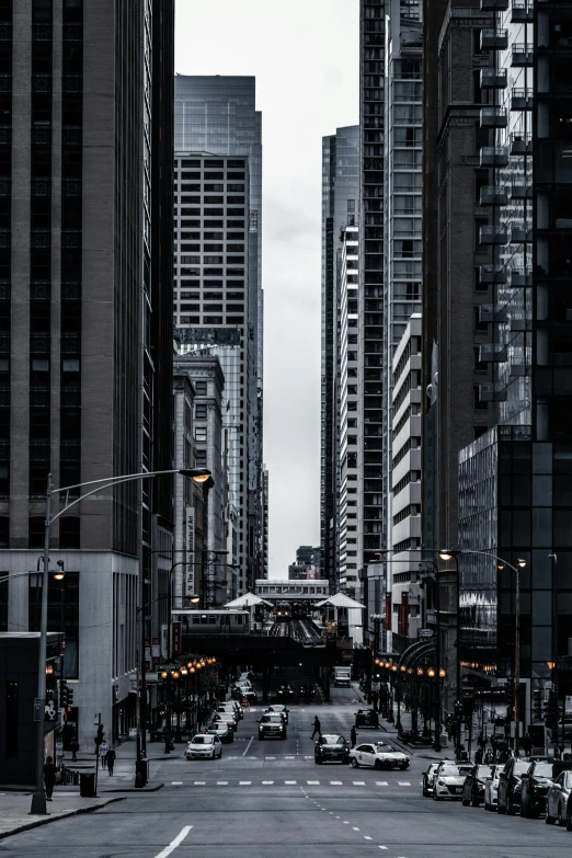 a city street filled with lots of tall buildings, inspired by Thomas Struth, pexels contest winner, chicago, dark city bus stop, high quality photo, from wheaton illinois