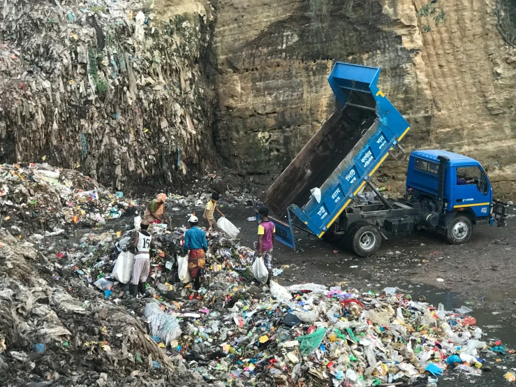 a dump truck parked next to a pile of garbage, by Daniel Lieske, reddit, plasticien, a group of people, avatar image, kano), panoramic shot