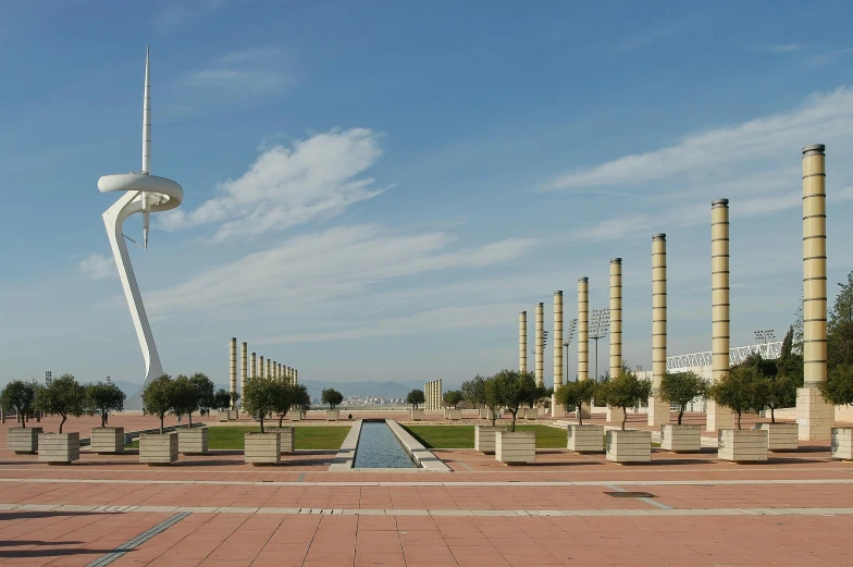 there is a sculpture in the middle of a park, inspired by Pedro Álvarez Castelló, pexels contest winner, modernism, minarets, terminal, view from front, panorama view