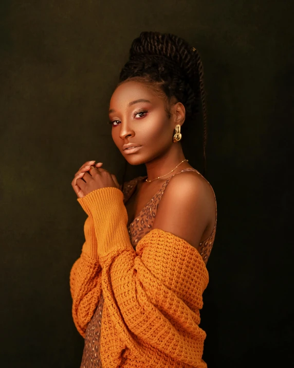 a woman in an orange sweater posing for a picture, an album cover, inspired by Chinwe Chukwuogo-Roy, trending on pexels, beautiful portrait lighting, brown skinned, ☁🌪🌙👩🏾, 3 / 4 pose