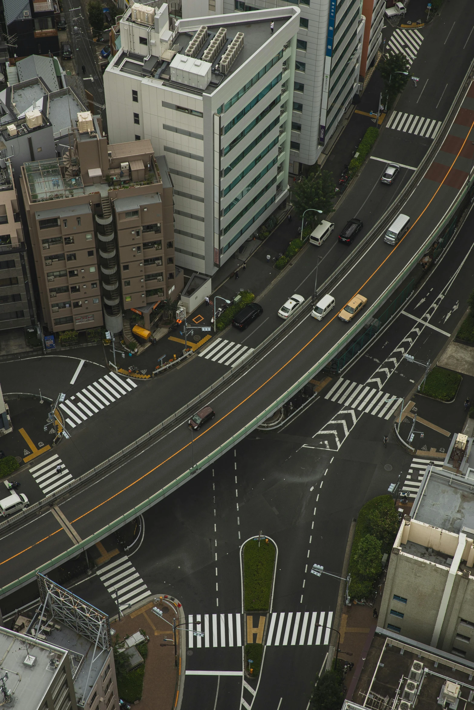 a view of a city from the top of a building, by Sengai, unsplash, shin hanga, crossing road, square, 2000s photo