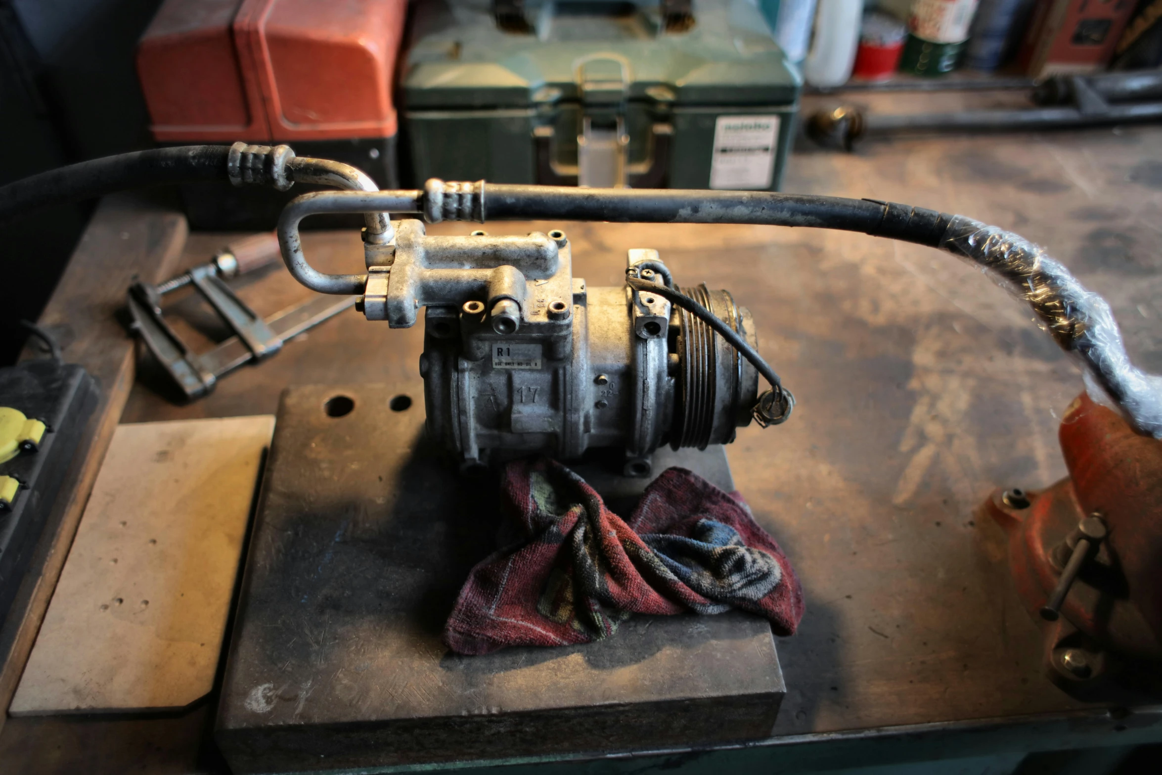 a close up of a motor on a table, a still life, unsplash, dressed in a worn, air conditioner, hydraulics, 15081959 21121991 01012000 4k