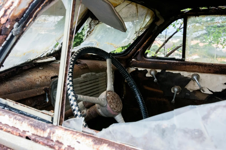 a close up of a car with a steering wheel, unsplash, auto-destructive art, standing in a space ship wreck, promo image, multiple stories, abandoned circus