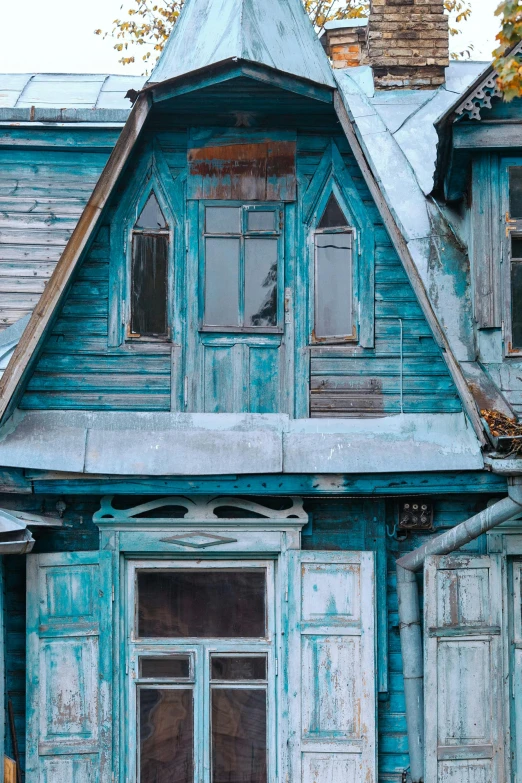 a blue wooden house with a metal roof, inspired by Isaac Levitan, trending on unsplash, maximalism, ruined town, color”, grey, up-close
