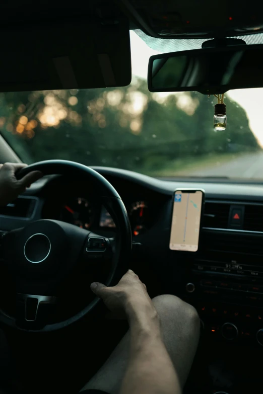 a close up of a person driving a car, square, iphone, tall, #trending