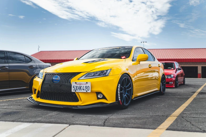 a yellow car is parked in a parking lot, by Jason Felix, pexels contest winner, on a street race track, 2013 scion tc, square, extremely high resolution