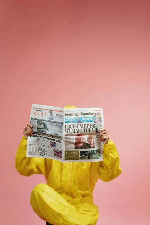 a man sitting on a toilet reading a newspaper, by Paul Bird, trending on unsplash, private press, yellow raincoat, wearing a light - pink suit, staff wearing hazmat suits, studio shot