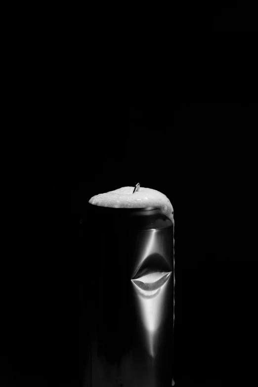 a black and white photo of a candle, inspired by Robert Mapplethorpe, detailled face, anonymous as a sausage, awarded on cgsociety, made out of shiny silver