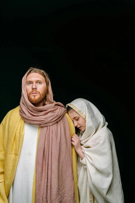 a man and a woman dressed as jesus and mary, a portrait, by Everett Warner, unsplash, square, cast, looking away, dustin lefevre