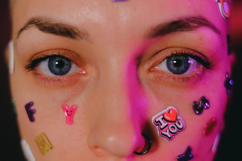 a close up of a person with confetti on their face, trending on pexels, hyperrealism, big pink eyes, heart eyes, cmyk portrait, hyperrealistic teen