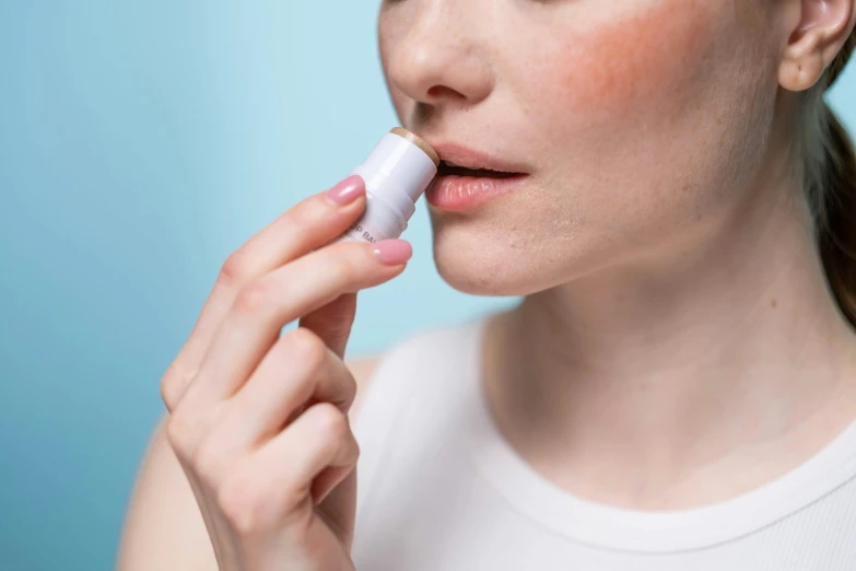 a woman brushing her teeth with an electric toothbrush, by Emma Andijewska, figuration libre, neck zoomed in from lips down, hibernation capsule close-up, detailed product image, white mist