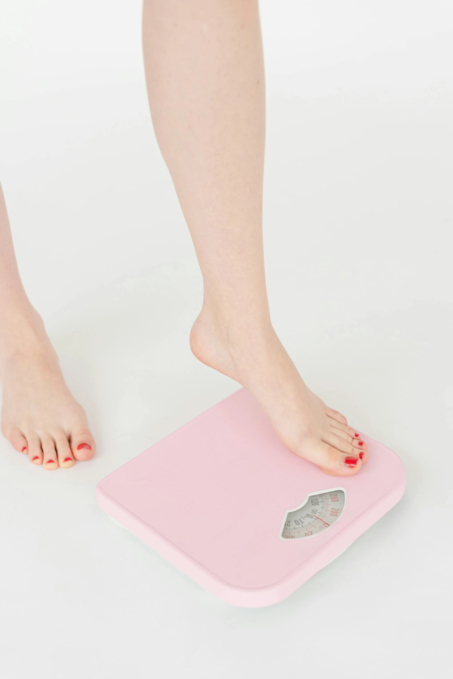 a woman standing on a pink bathroom scale, by Arabella Rankin, pexels, figuration libre, with a white background, square jaw, akira yoshizawa, promo image