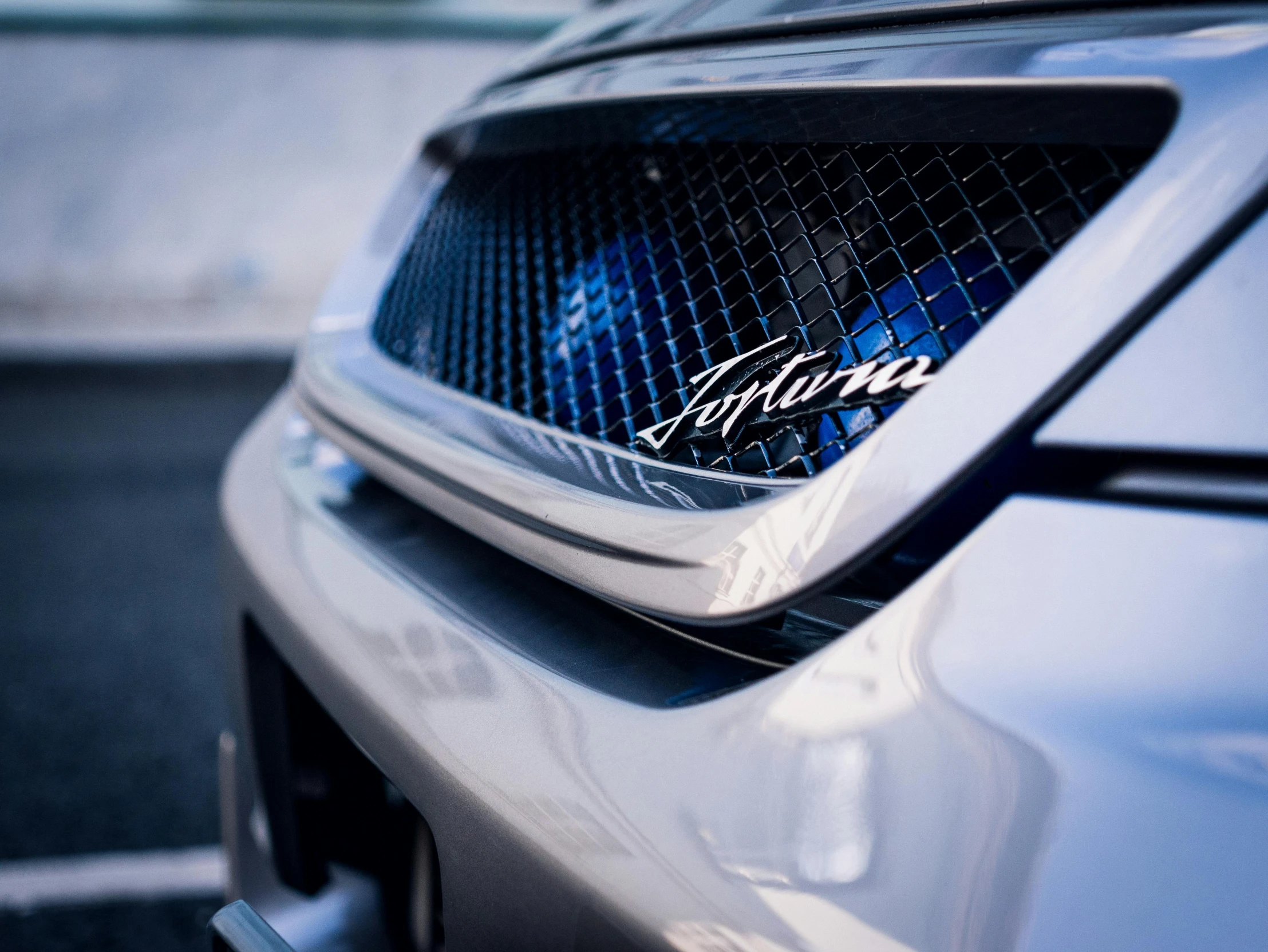 a close up of the front of a car, trending on unsplash, purism, takumi fujiwara, avatar image, fan favorite, raptor