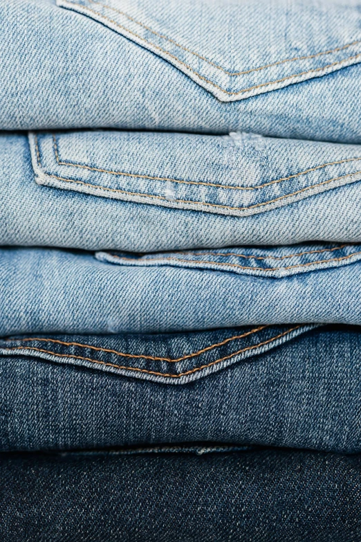 a stack of jeans stacked on top of each other, avatar image, scrubs, medium - shot, small