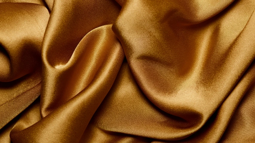 a close up of a brown satin fabric, inspired by Frederic Leighton, trending on pexels, ochre, yellow, diverse, honey