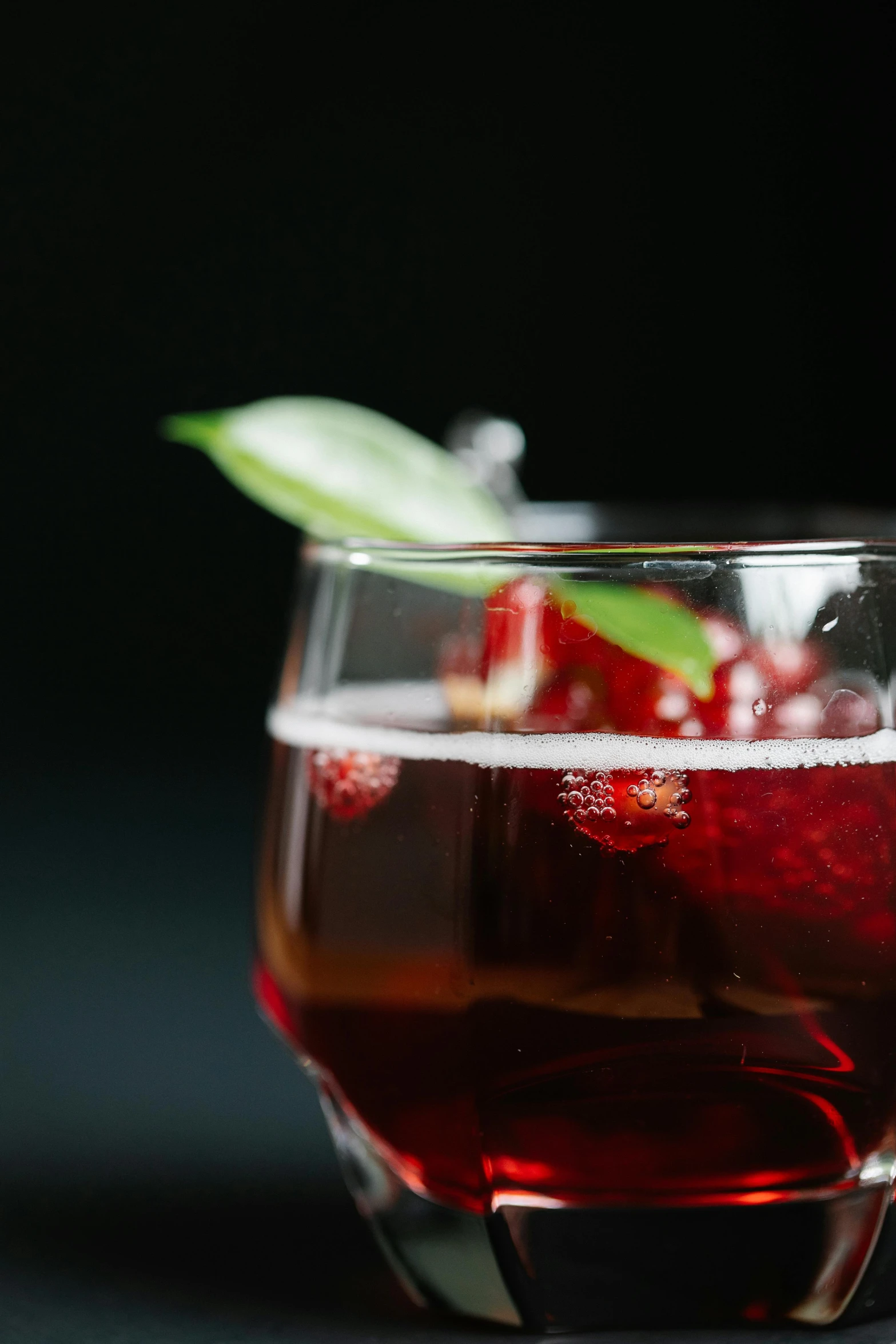 a close up of a drink in a glass, crimson themed, bubbly, thumbnail, alternate angle