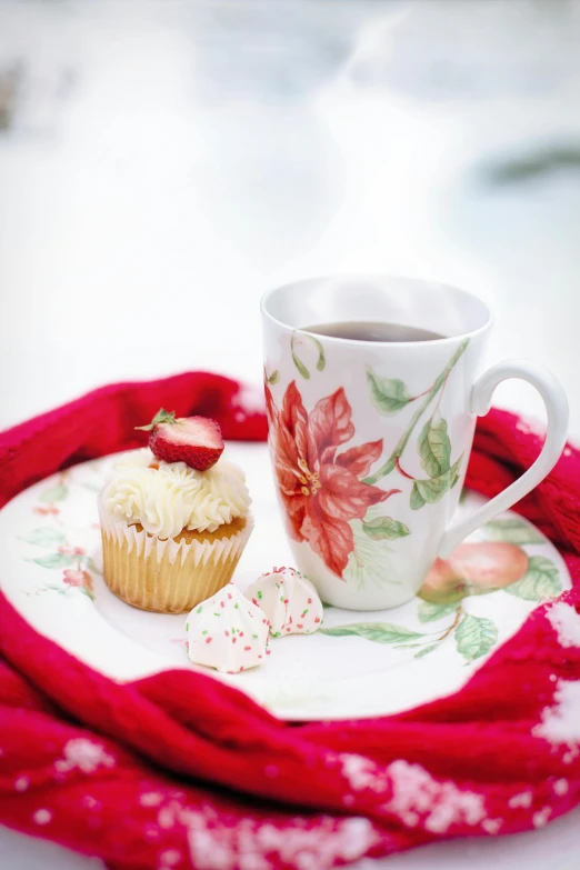 a cup of coffee and a muffin on a plate, by Elaine Hamilton, shutterstock contest winner, romanticism, winter photograph, white mug, accents of red, pastel'