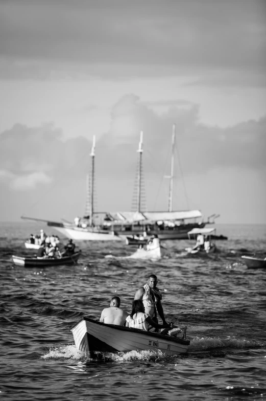 a group of people riding on top of a boat in the ocean, by Albert Welti, street photo, three masts, yuli ban, f / 2