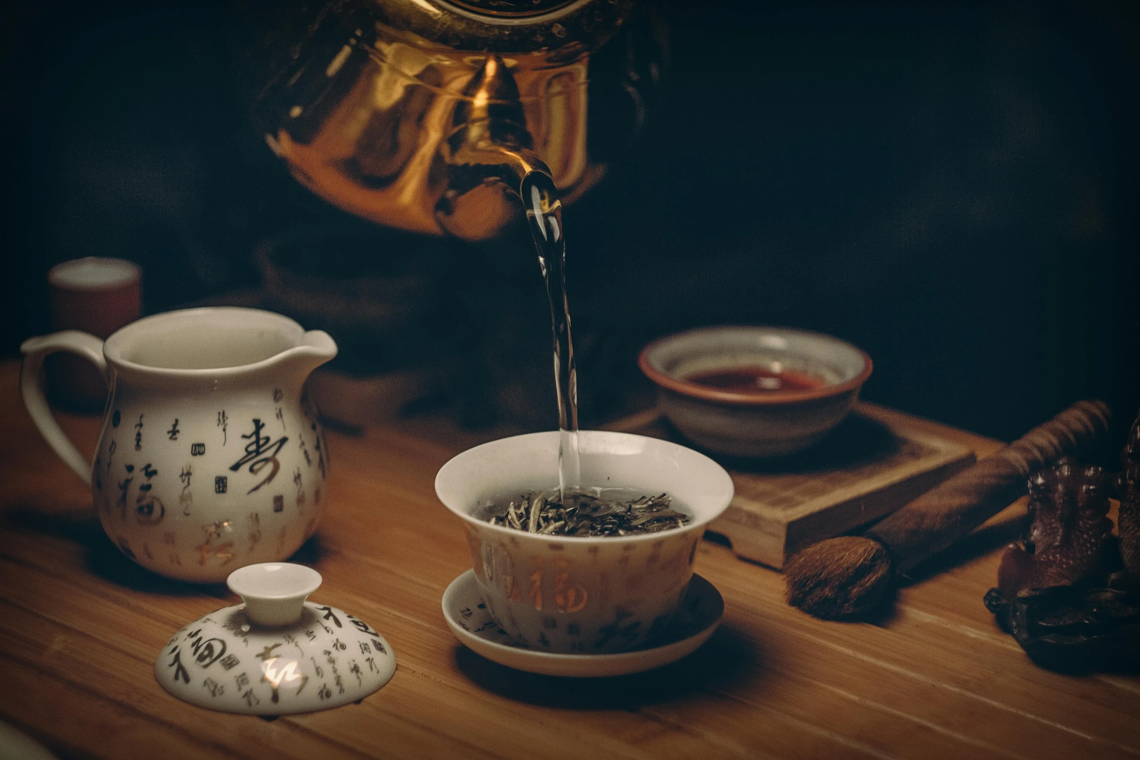 a tea pot pouring tea into a cup, a still life, inspired by Sesshū Tōyō, trending on pexels, nightcap, smooth intricate, lo fi, manuka