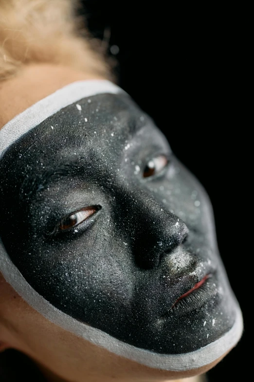 a close up of a person with a painted face, inspired by jeonseok lee, dark glitter, mars black, skimask, synthetic bio skin