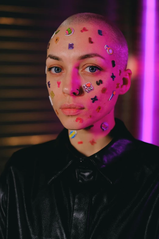 a woman with pink paint on her face, an album cover, by Julia Pishtar, trending on pexels, antipodeans, buzz cut, made of dots, ashteroth, lights on