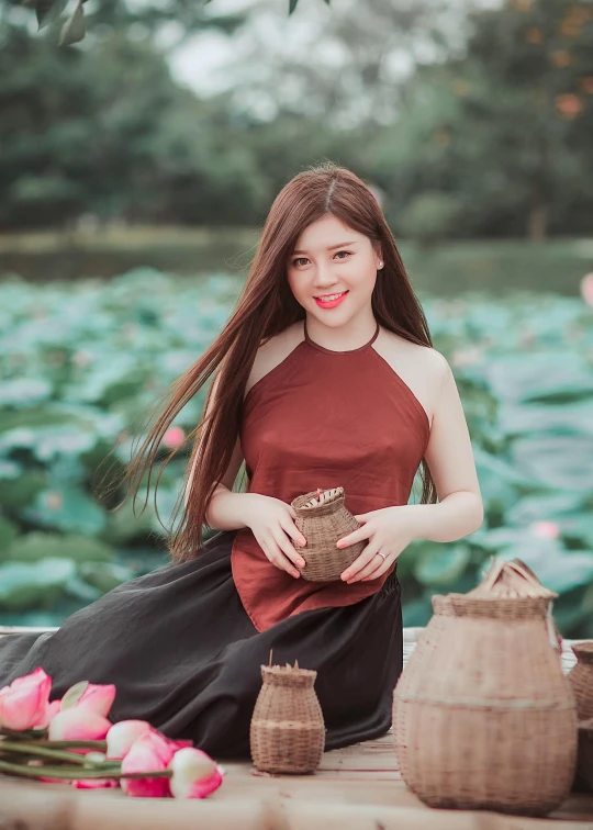 a woman sitting on a dock next to a body of water, a picture, inspired by Tan Ting-pho, standing gracefully upon a lotus, 8k selfie photograph, profile image, vietnamese woman