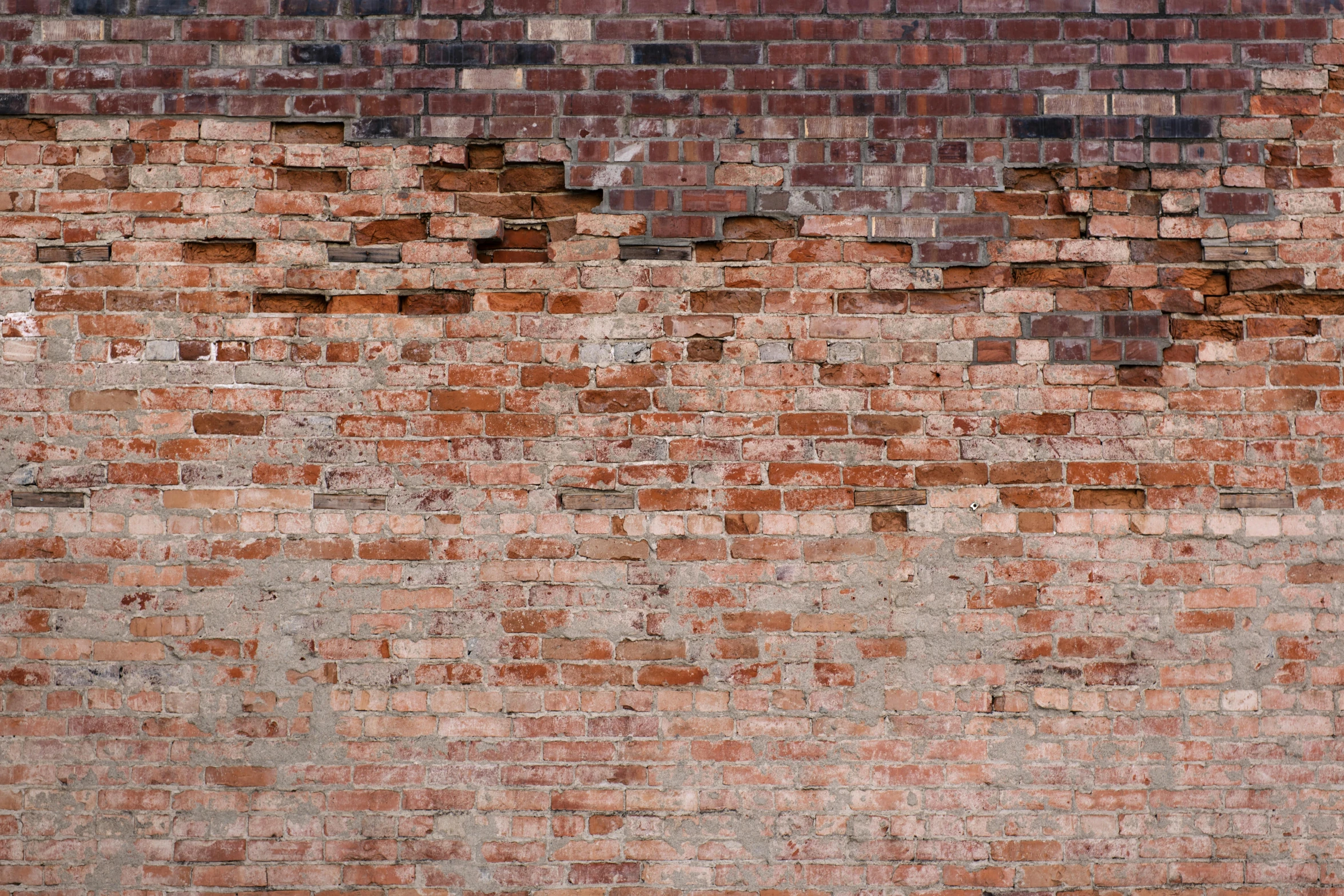 a fire hydrant in front of a brick wall, an album cover, by Carey Morris, renaissance, rotten textures, background image, tileable, 3 4 5 3 1