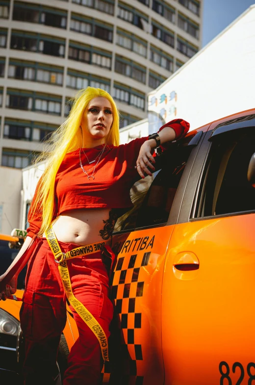 a woman with yellow hair standing next to a taxi, an album cover, inspired by Louisa Matthíasdóttir, pexels, renaissance, orange and yellow costume, photograph of a techwear woman, hot topic anime convention, ghetto