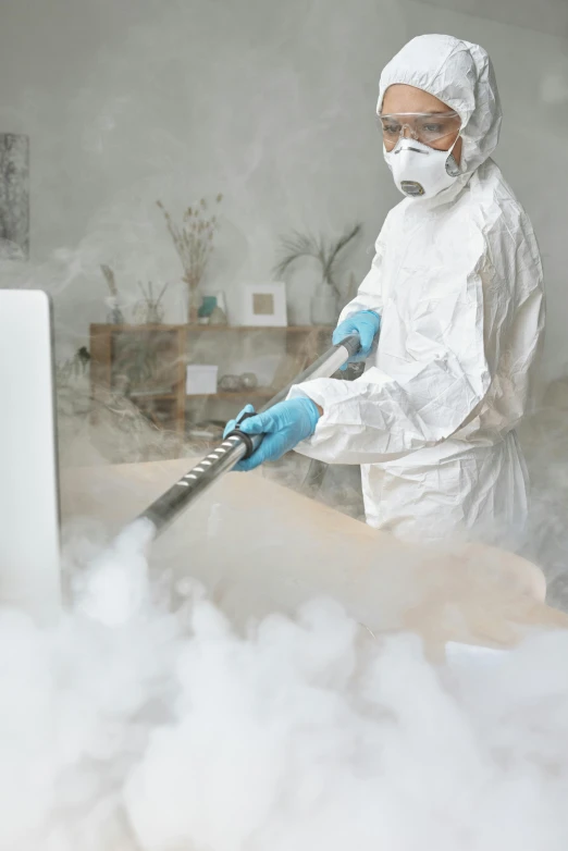 a man in a white hazmat suit using a smoke blower, many cryogenic pods, thumbnail, black mold, avatar image