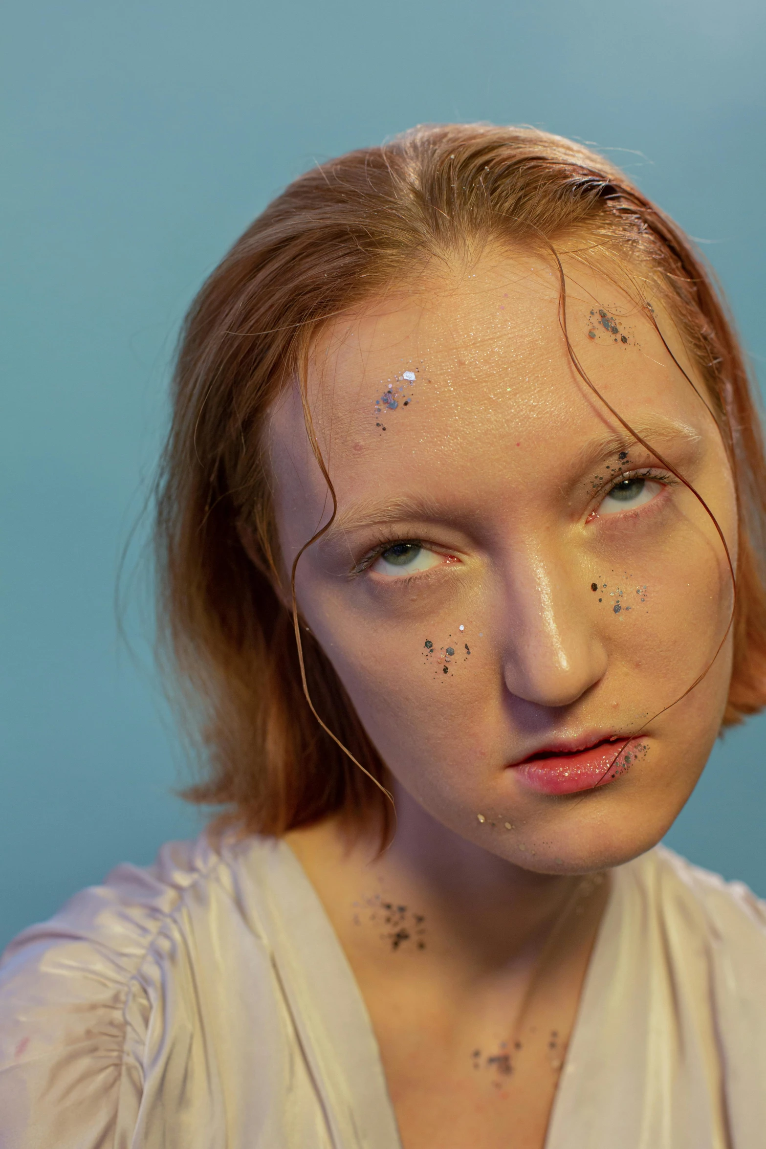 a close up of a woman with freckles on her face, an album cover, lily frank, heavily downvoted, high quality photo, mess